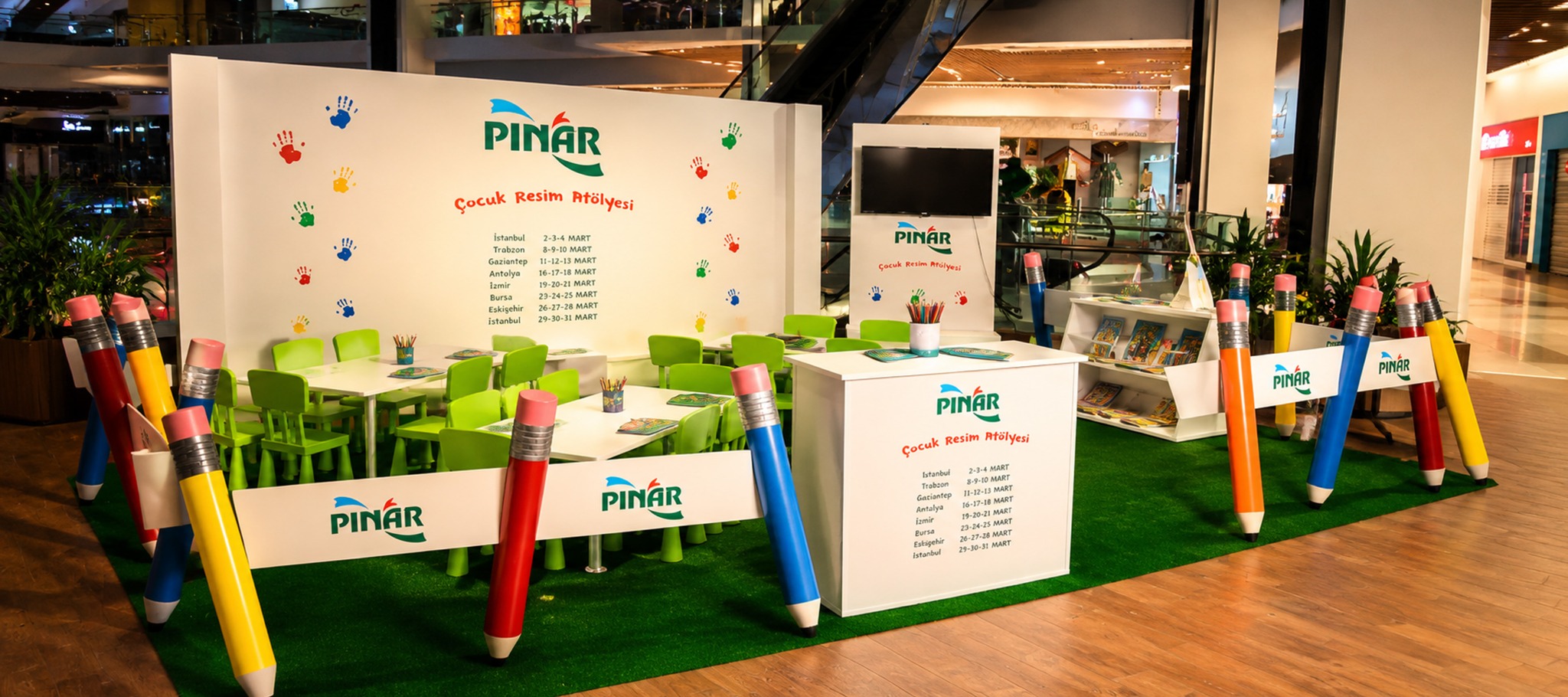 Pınar children's painting workshop activation with colorful pencils and activity tables